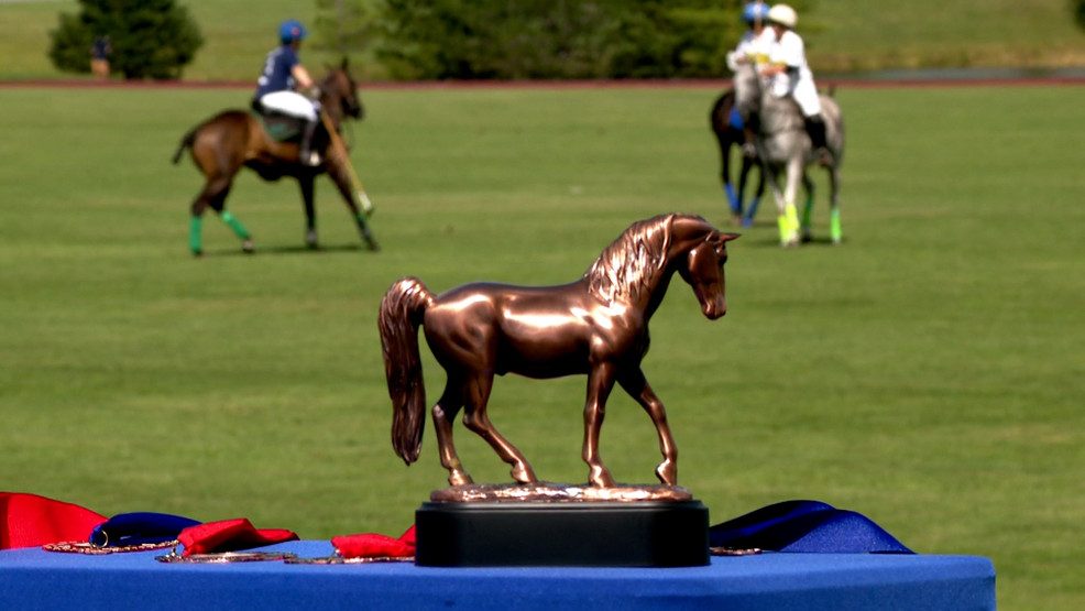 Skaneateles Polo Club trophy and award medals at a match